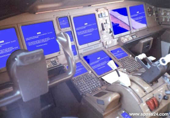 Billede fra flycockpit hvor alle computerne er ramt af 'blue screen of death'
